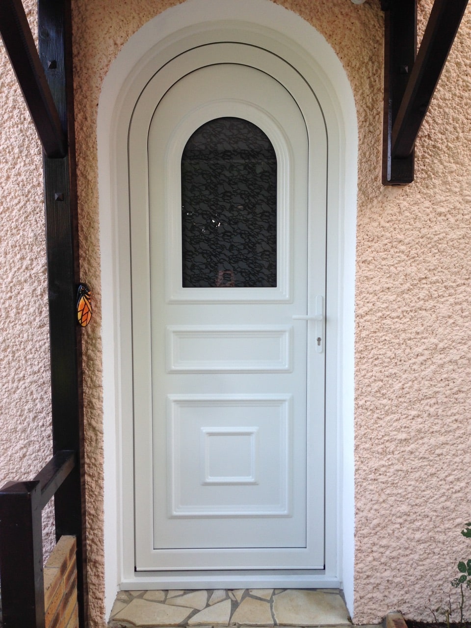 Porte d’entrée cintrée en aluminium